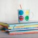 A stack of brightly colored children's books.