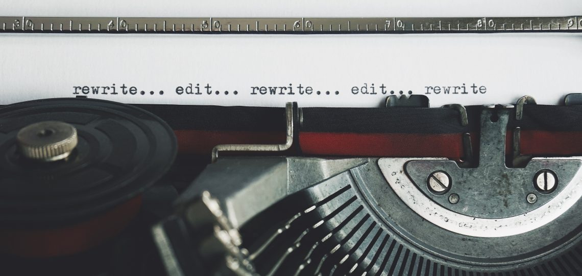 A close-up of a typewriter, this image evokes the feeling of self editing your novel, as the words "edit... rewrite... edit.... rewrite..." span the page.