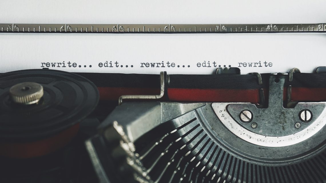 A close-up of a typewriter, this image evokes the feeling of self editing your novel, as the words "edit... rewrite... edit.... rewrite..." span the page.