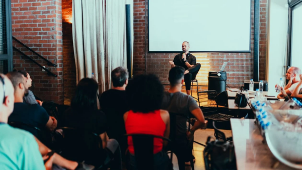 A group of people listening to a presentation.