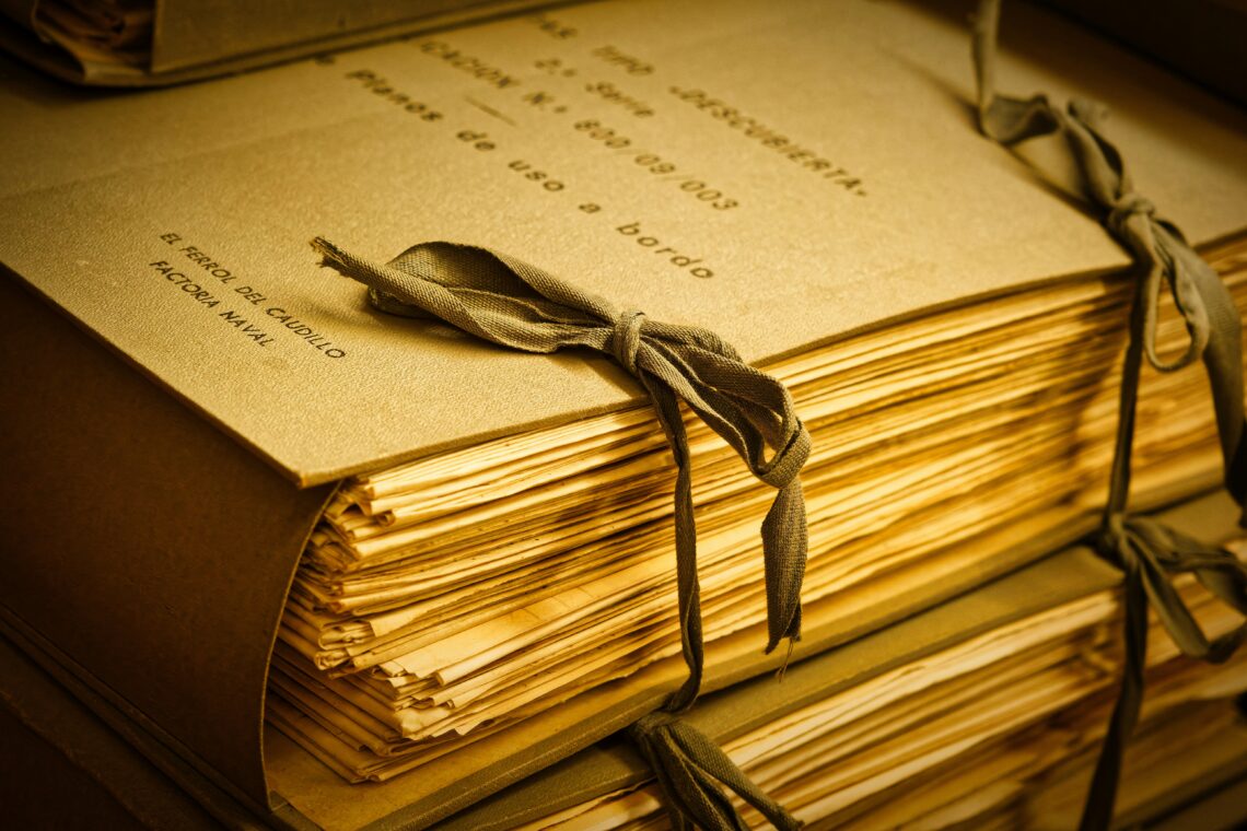 A stack of papers (a manuscript) tied together with string.